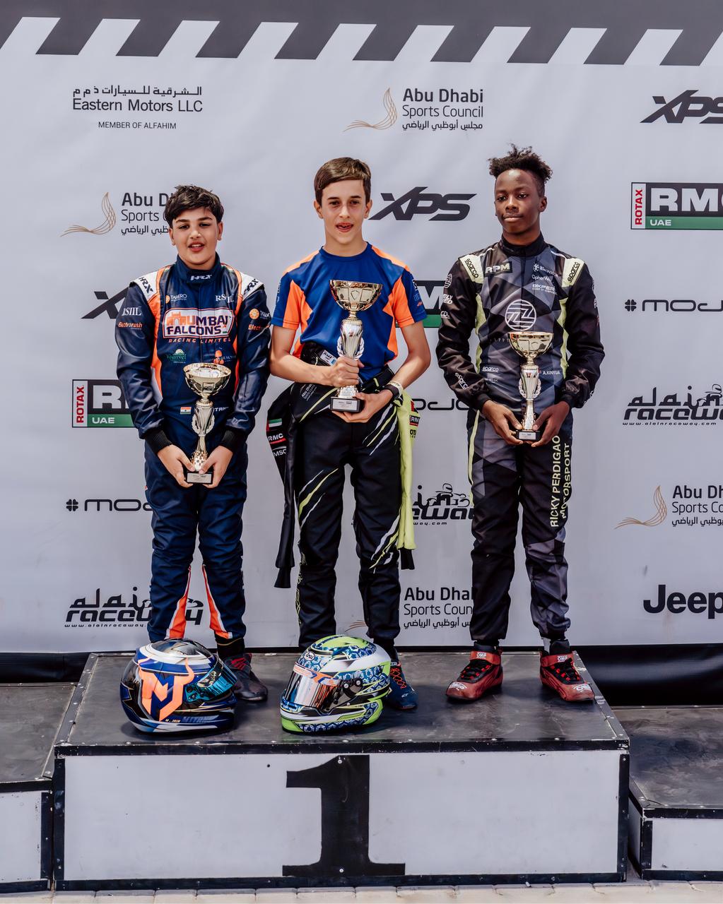 Amani on the third step of the podium