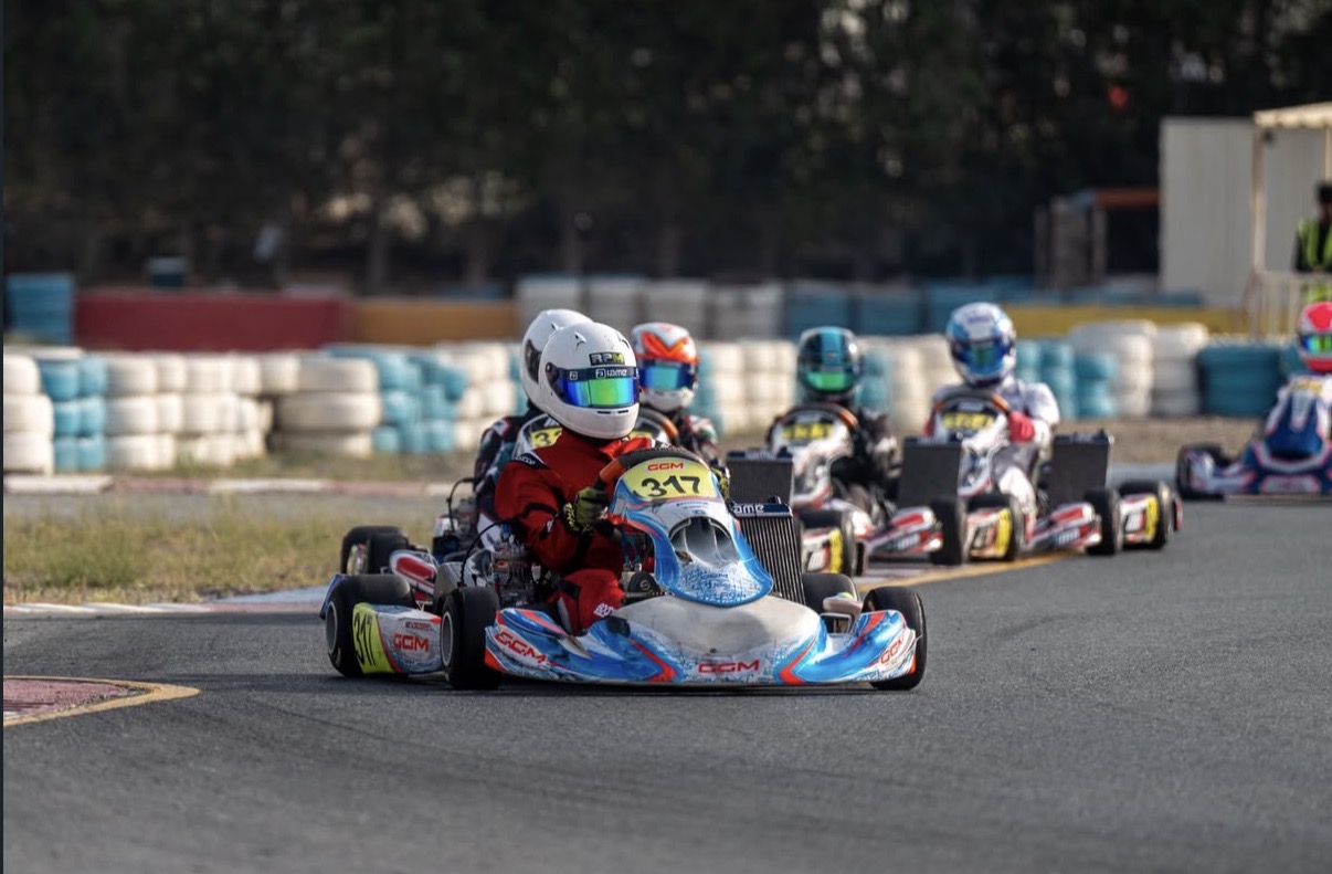 Amani Kinyua racing kart 317 on track